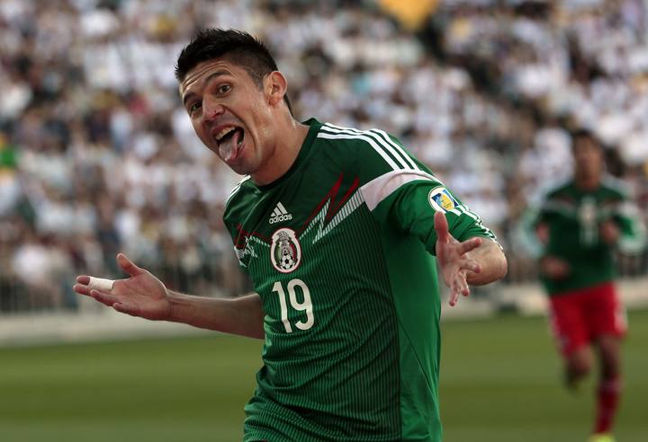 Mexico's Peralta celebrates after scoring a goal against New Zealand during their 2014 World Cup qualifying playoff second leg soccer match in Wellington