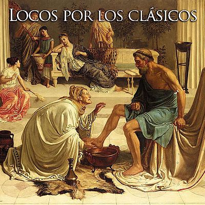 En un interior con arquitectura clásica, una mujer arrodillada lava los pies de un hombre sentado, revelando su identidad. Una segunda mujer observa la escena desde un lugar elevado, rodeada de otros personajes.