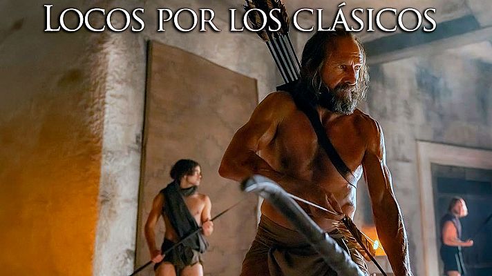 En una escena de la obra, un hombre barbudo y con el torso descubierto sostiene un arco y flechas, mientras que otros dos hombres, uno con una lanza, se encuentran en un interior rústico.