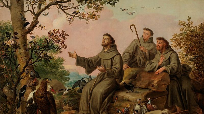 San Francisco de As�s, vestido con su h�bito, predica rodeado de diversas aves y acompa�ado por dos frailes en un paisaje natural de tonos c�lidos al amanecer.