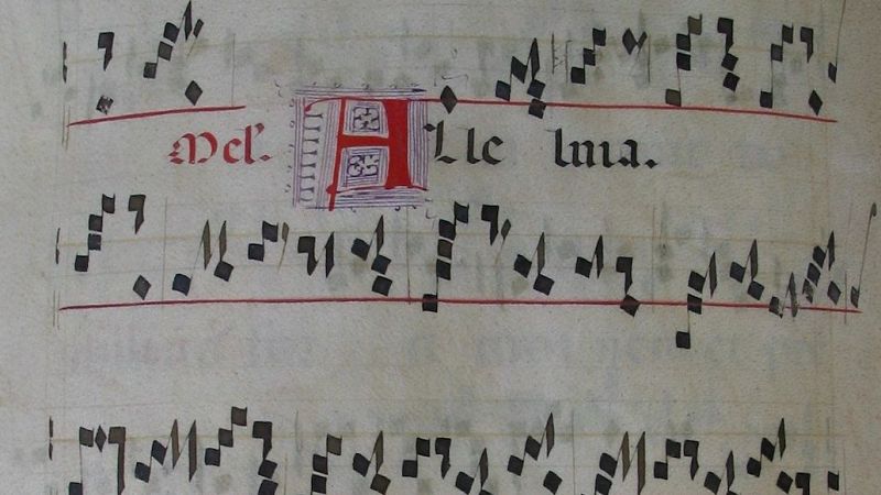 Fragmento de manuscrito musical lit�rgico antiguo con notaci�n neum�tica sobre pergamino, destacando la palabra Alleluia con letra capitular iluminada en rojo y azul.