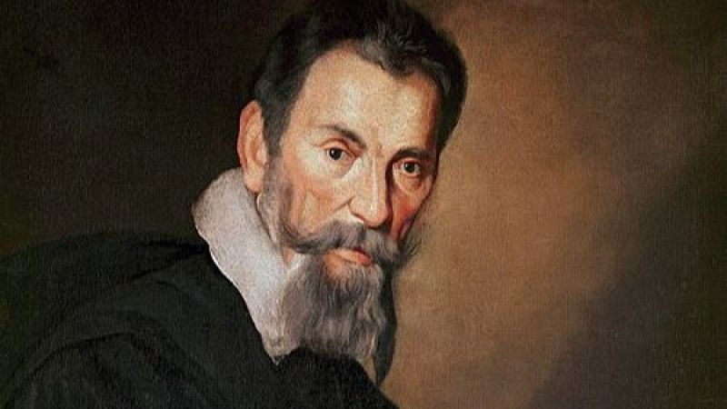 Retrato al �leo de Claudio Monteverdi con h�bito oscuro y cuello blanco, iluminado mediante un marcado estilo de claroscuro barroco.
