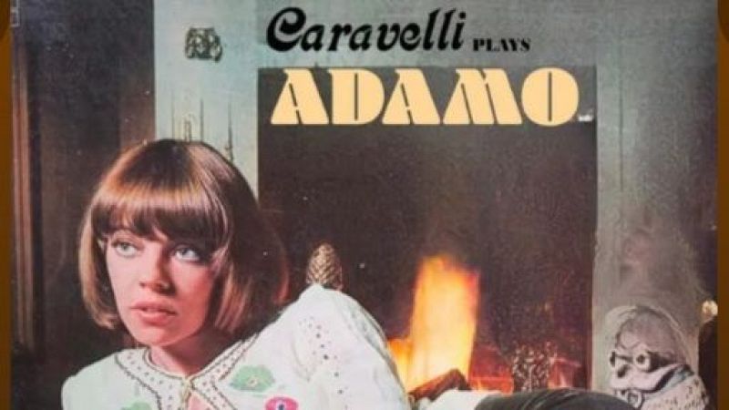 Portada de �lbum retro donde una mujer joven con blusa bordada descansa frente a una chimenea encendida.