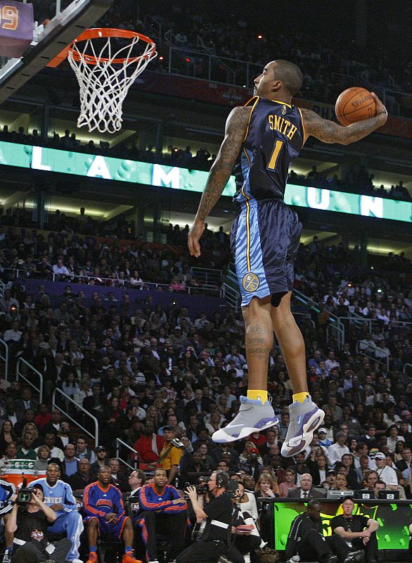 Denver Nuggets' J.R. Smith competes in the Slam Dunk contest at NBA All-Star weekend in Phoenix, Arizona