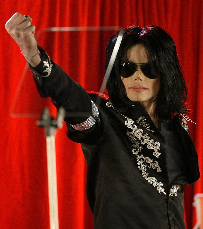 U.S. pop star Michael Jackson gestures during a news conference at the O2 Arena in London