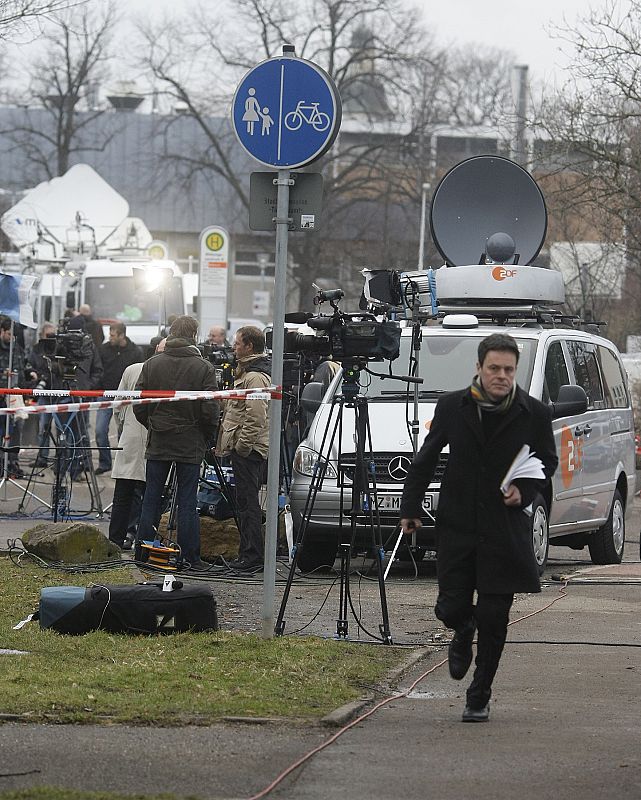 Media gathers near the Albertville-Realschule school where a shooting incident took place in Winnenden