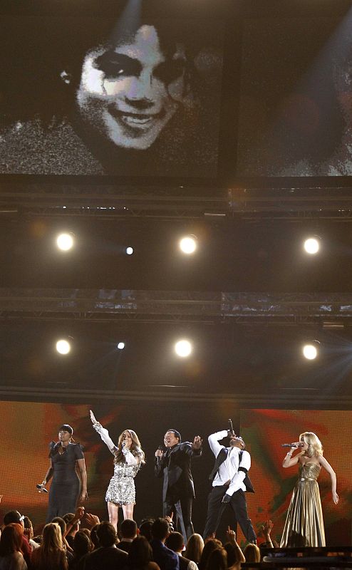 Hudson, Dion, Robinson, Usher, and Underwood sing a tribute to Michael Jackson at the 52nd annual Grammy Awards in Los Angeles