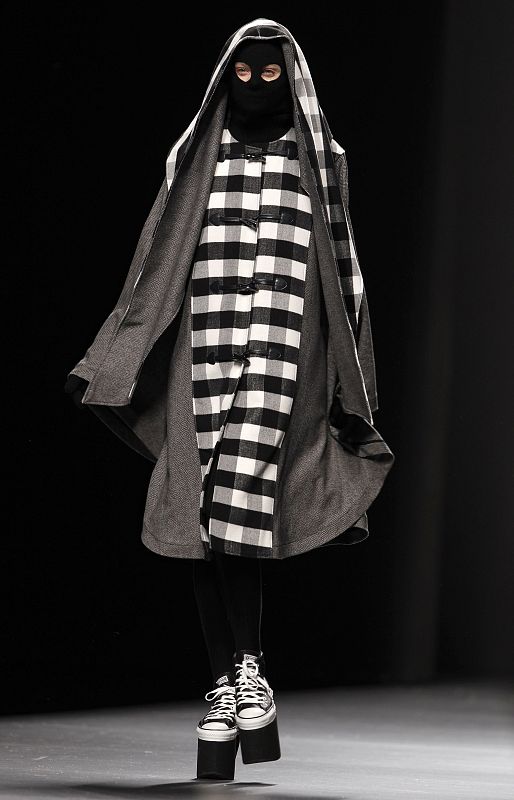 A model presents a creation by Carlos Diez during Cibeles Madrid Fashion Week Fall/Winter 2010 show in Madrid