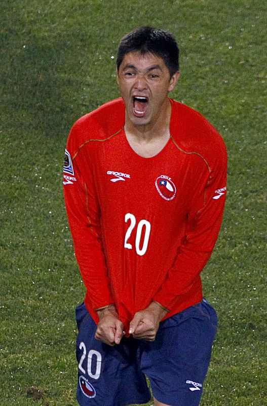 Chile's Rodrigo Millar celebrates scoring a goal during a 2010 World Cup Group H match against Spain at Loftus Versfeld stadium