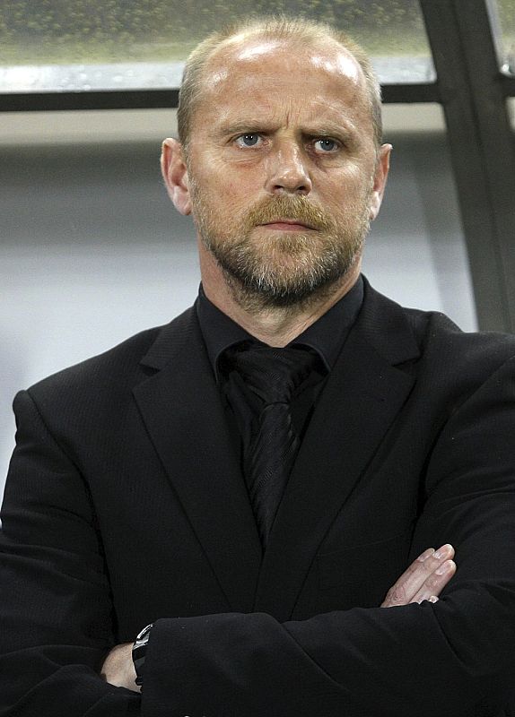 Werder Bremen coach Schaaf watches their UEFA Cup quarter-final match against Udinese in Udine
