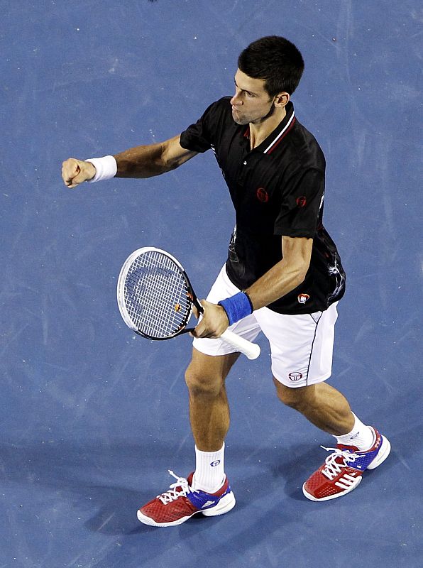 Djokovic celebra un punto contra Nadal
