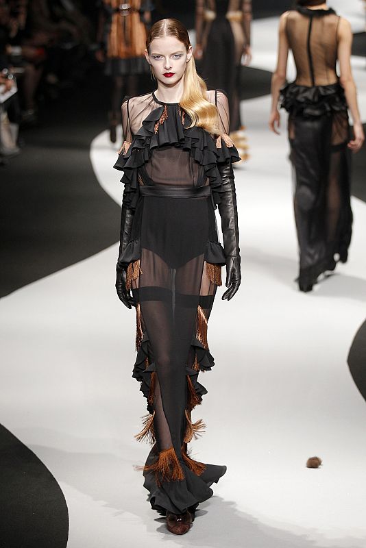 A model presents a creation by Dutch designers Viktor and Rolf as part of their Fall/Winter 2012-2013 women's ready-to-wear fashion show during Paris fashion week