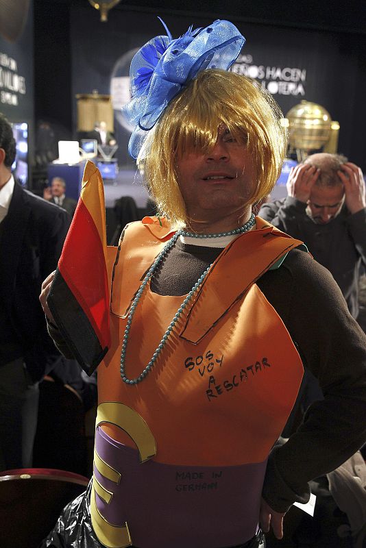 Angela Merkel tampoco se ha querido perder el sorteo de la Lotería de Navidad 2012. "Sos voy a rescatar", dice.