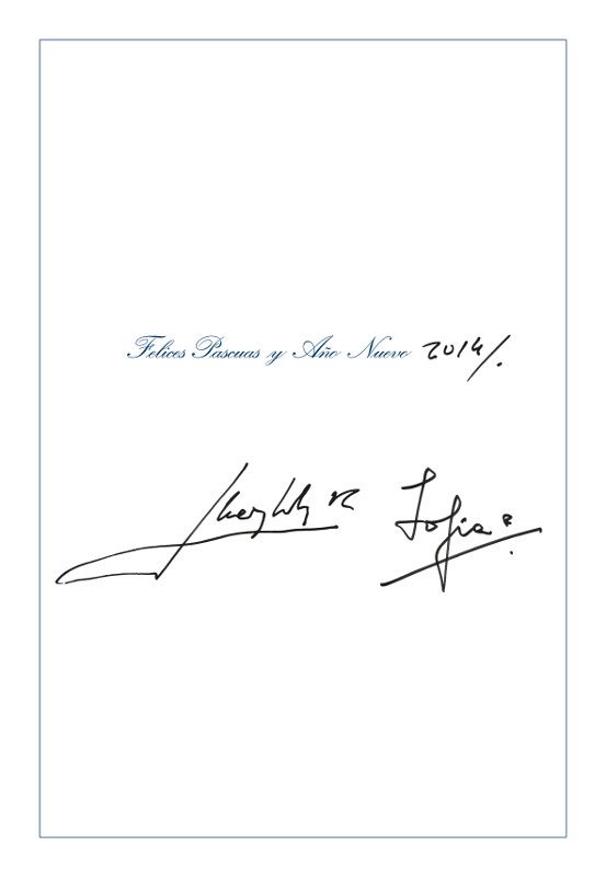 Los reyes Juan Carlos y Sofía firman su propia felicitación navideña.