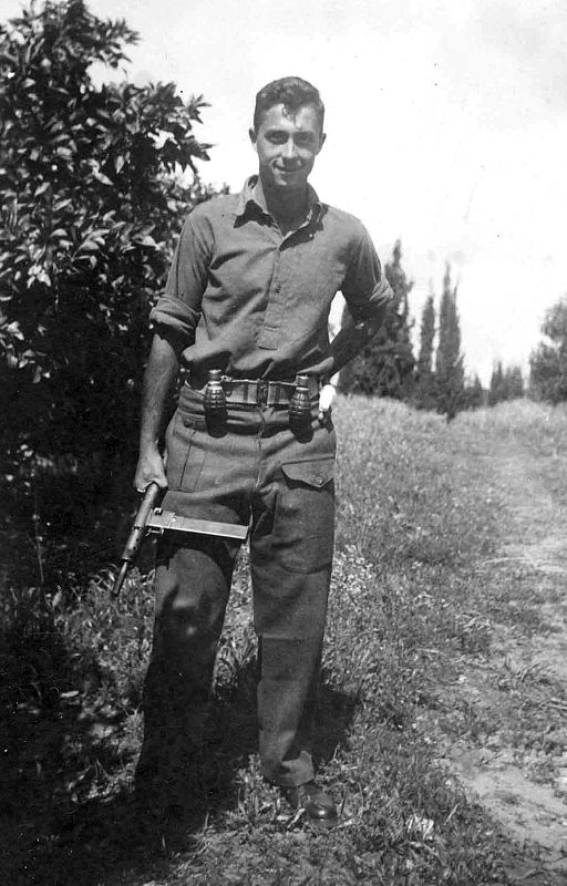 Handout file picture of Israeli soldier Sharon holding a weapon during the war of Israel's founding