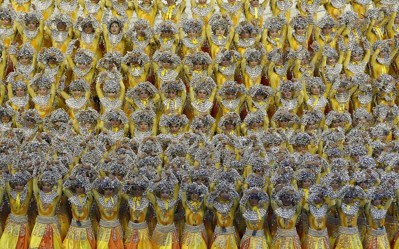 Performers take part in the closing ceremony of the Beijing 2008 Olympic Games at the National Stadium