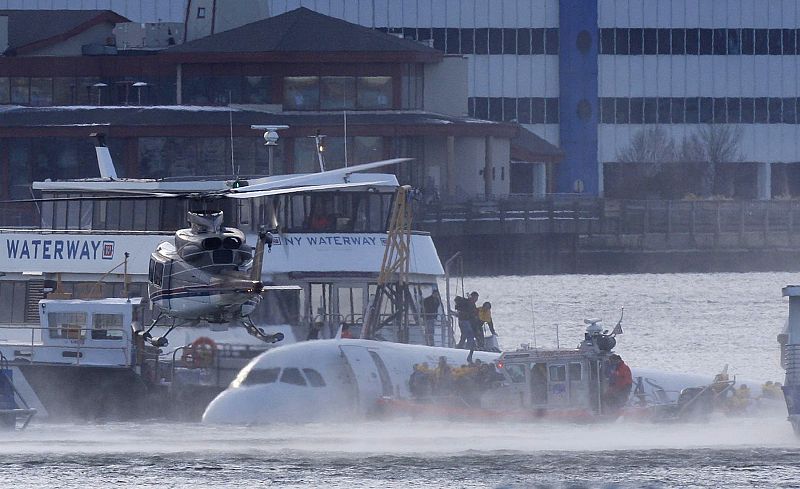 Passengers are rescued after a U.S. Airways plane landed in the Hudson River in New York