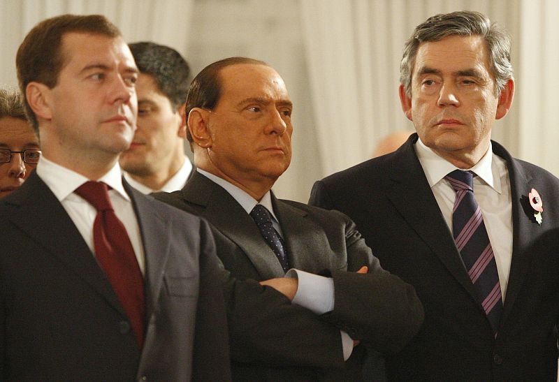 Russian President Medvedev Italian Prime Minister Berlusconi and British Prime Minister Brown attend a reception at Bellevue Castle in Berlin