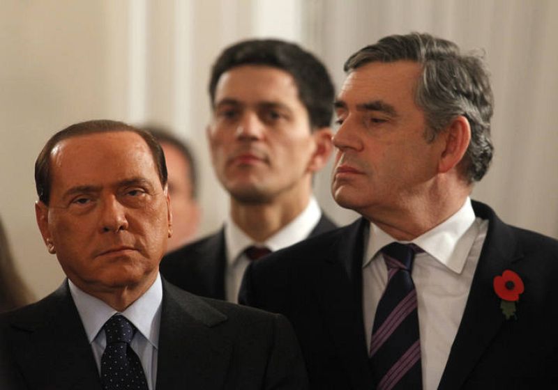 Italian Prime Minister Berlusconi Britain's Foreign Minister Miliband and Prime Minister Brown attend a reception at Bellevue Castle in Berlin