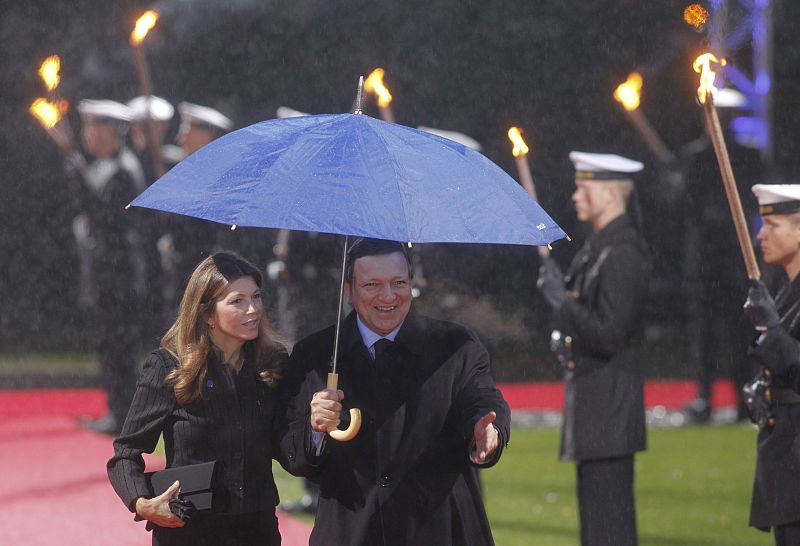 European Commission President Barroso and his wife Margarita arrive at the presidential Bellevue Palace in Berlin