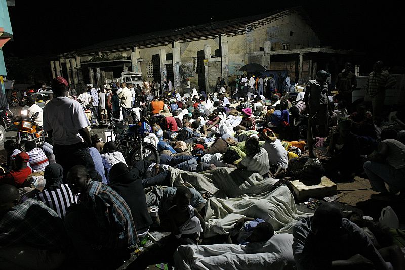 Residents sleep in the street after an earthquake in Port-au-Prince