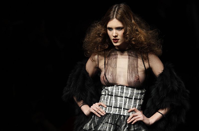 A model displays a creation by Spanish designer Francis Montesinos during the Cibeles Madrid Fashion Week Fall/Winter 2010 show in Madrid