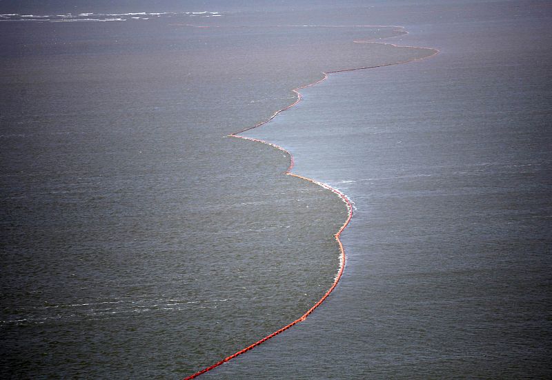 Oil booms are seen near the coast of South Pass, south of Venice, Louisiana, where oil leaking from the Deepwater Horizon wellhead continues to spread in the Gulf of Mexico
