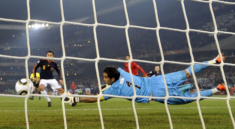 Chile's goalkeeper Bravo concedes a goal against Spain during a 2010 World Cup Group H match at Loftus Versfeld stadium in Pretoria