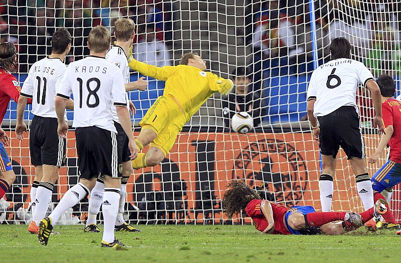 Spain's Carles Puyol scores a goal during their 2010 World Cup semi-final soccer match at Moses Mabhida stadium