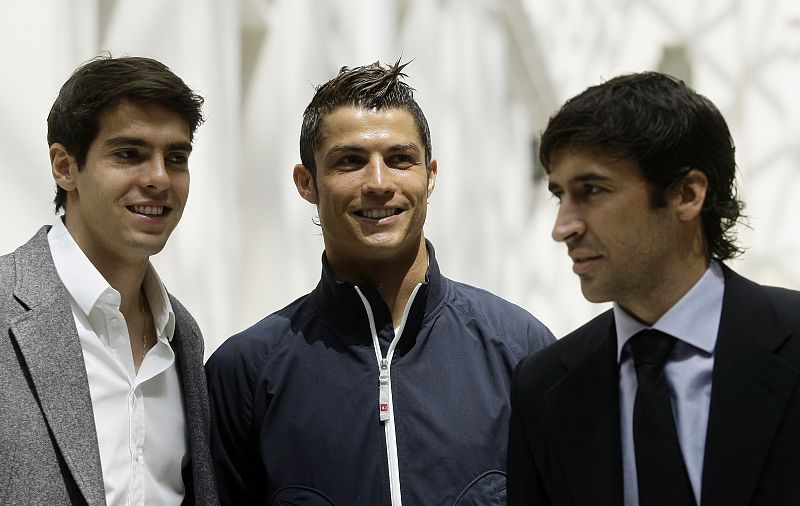 Real Madrid players Kaka, Cristiano Ronaldo and Raul arrive for the handing over ceremony of the UEFA Champions League trophy in Madrid