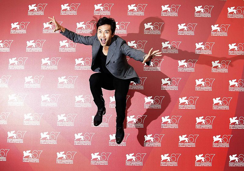 Actor Deng poses during a photocall for the movie "Detective Dee and the mystery of Phantom Flame" at the 67th Venice Film Festival