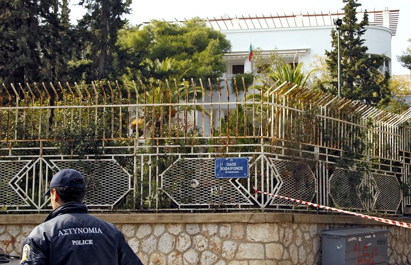 Greek policeman stands guard outside the Bulgarian Embassy in Athens