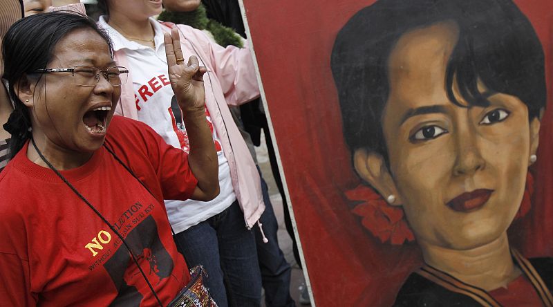 Supporter of Myanmar's pro-democracy leader Suu Kyi celebrates in New Delhi