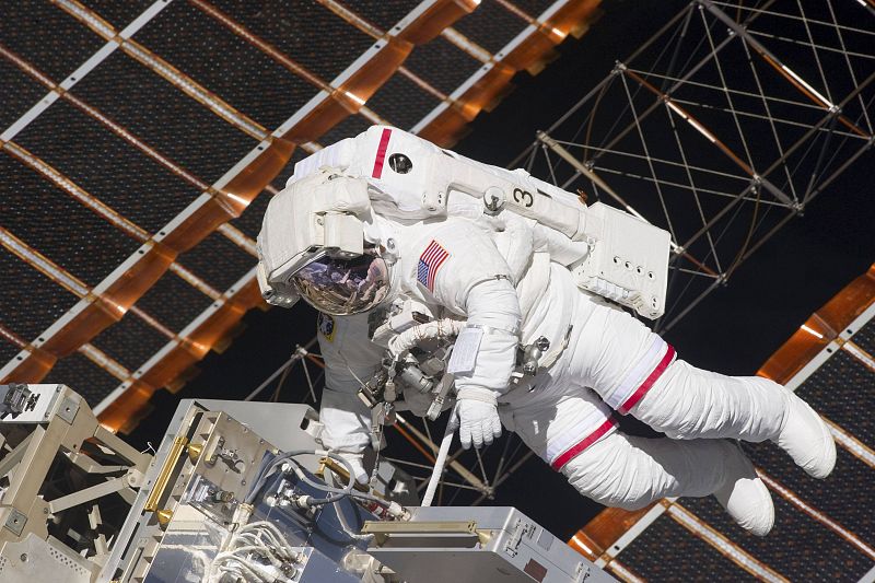 NASA astronaut Andrew Feustel works outside the International Space Station