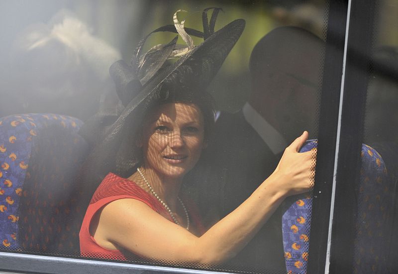 A guest arrrives for the wedding between Britain's Zara Phillips and Mike Tindall at Canongate Kirk in Edinburgh