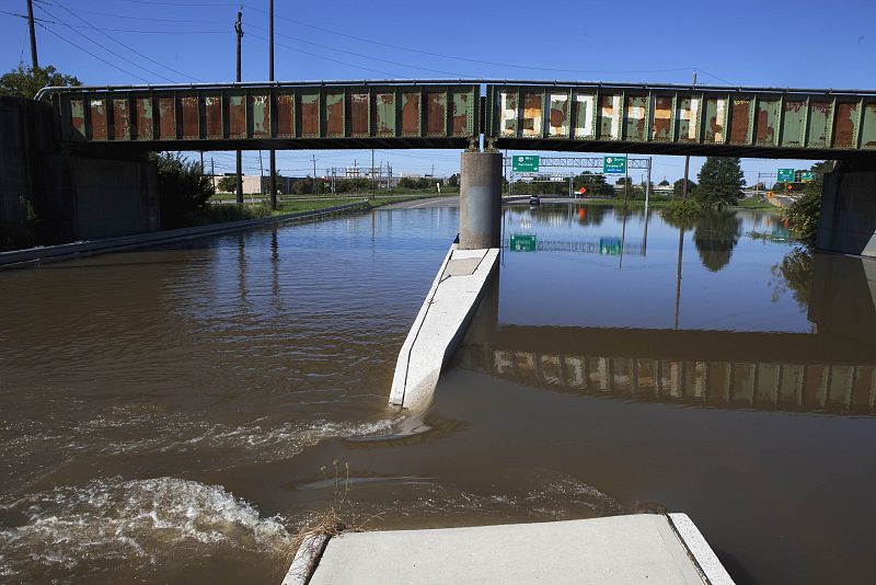 Water drains off of a highway during flooding caused by Hurricane Irene in Wayne