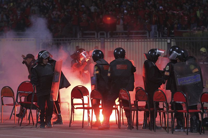 Police react as chaos erupts at a soccer stadium in Port Said city, Egypt