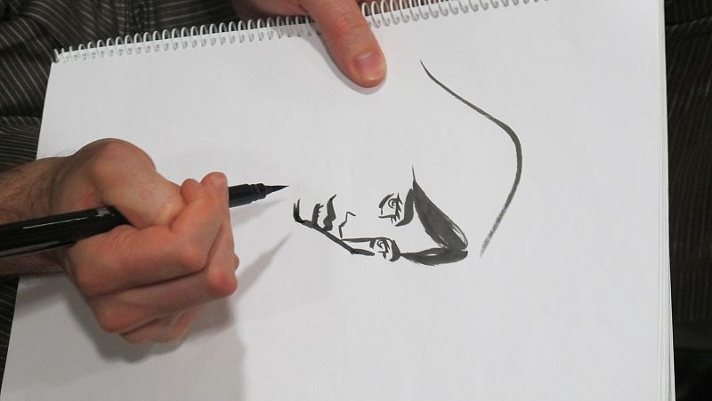 Craig Thompson haciendo una dedicatoria de 'Habibi'