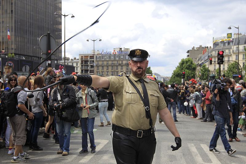 A participant attends the first Gay Pride march Marche des Fiertes since a French law permitting gay and lesbian marriage was passed in Paris