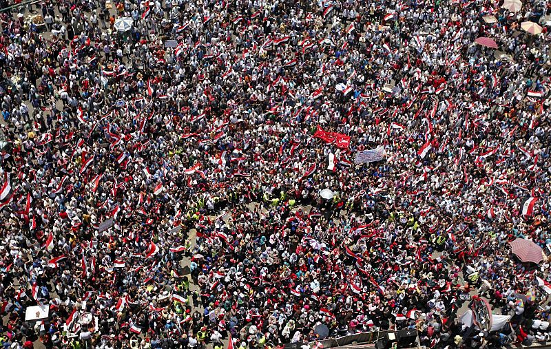 Protesters opposing Egyptian President Mursi shout slogans during a demonstration in Tahrir square in Cairo