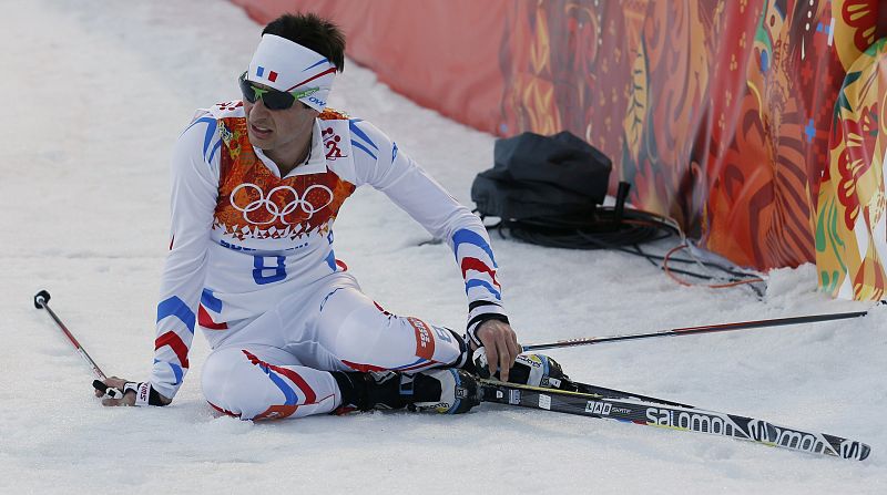 Chappuis reacts after crossing the finish line in the cross country race of the Nordic Combined individual normal hill 10 km event of the Sochi 2014 Winter Olympic Games