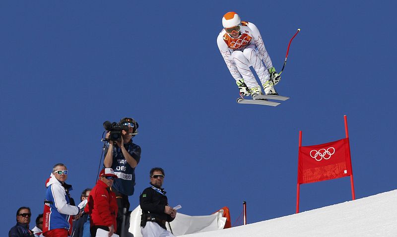 Miller of the U.S. goes airborne during the downhill run of the men's alpine skiing super combined event at the 2014 Sochi Winter Olympics