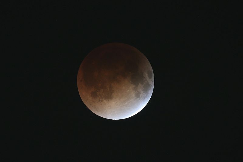 Rare Lunar Eclipse Cast Red Cast Over Moon