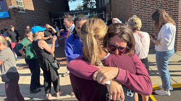 Parents await news of their children after a reported mass shooting at Annunciation Church on Wednesday, Aug. 27, 2025, in Minneapolis. (Richard Tsong-Taatarii/Star Tribune via AP)