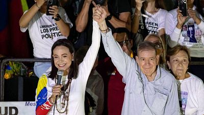 La l�der opositora venezolana Mar�a Corina Machado y el excandidato presidencial Edmundo Gonz�lez Urrutia, en un acto de campa�a en Caracas, en julio de 2024.