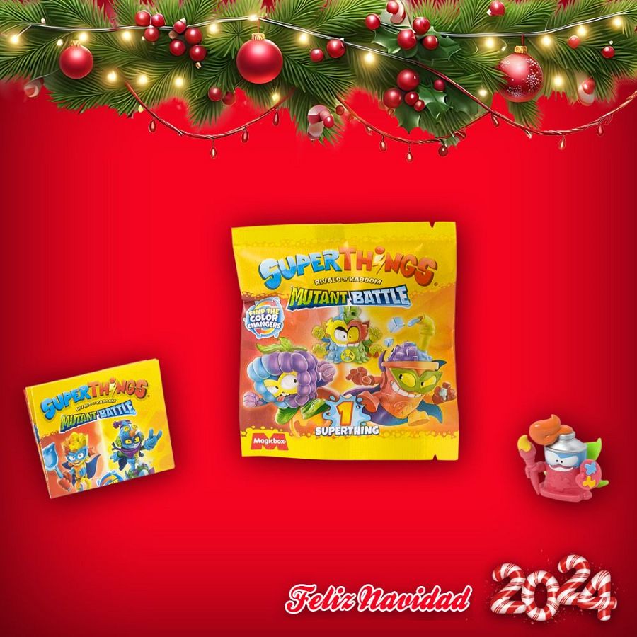 Revista Clan diciembre 2024 con SuperThings Mutant Battle. Se ve un sobre, una caja y una figura, con el texto "Feliz Navidad 2024" sobre fondo rojo.