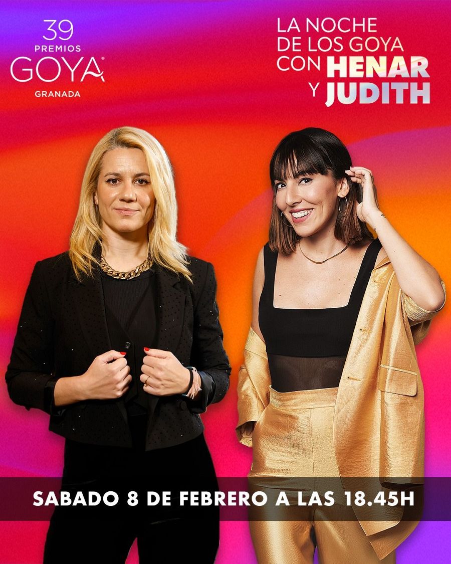 Dos mujeres, una rubia y una morena, presentan "La Noche de los Goya" el sábado 8 de febrero a las 18:45h. Fondo degradado en tonos cálidos.