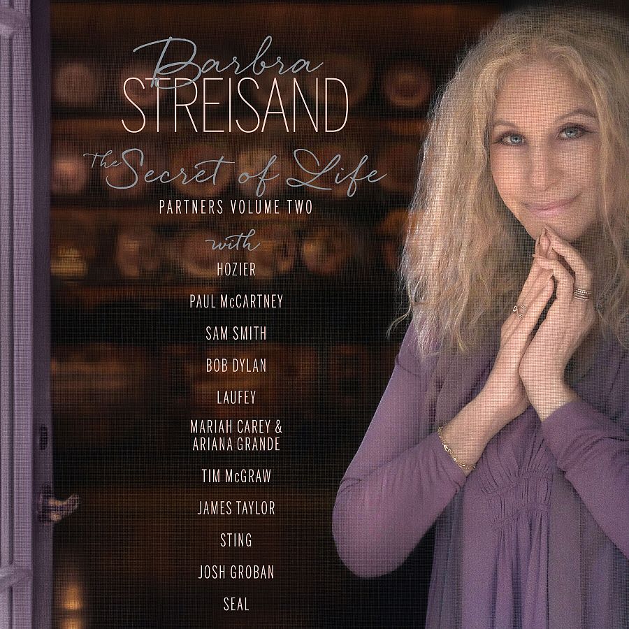 Barbra Streisand en la portada de su nuevo disco, "The Secret of Life: Partners Volume Two", con blusa malva y expresión serena.  Colaboraciones con Hozier, Paul McCartney, Sam Smith y más.