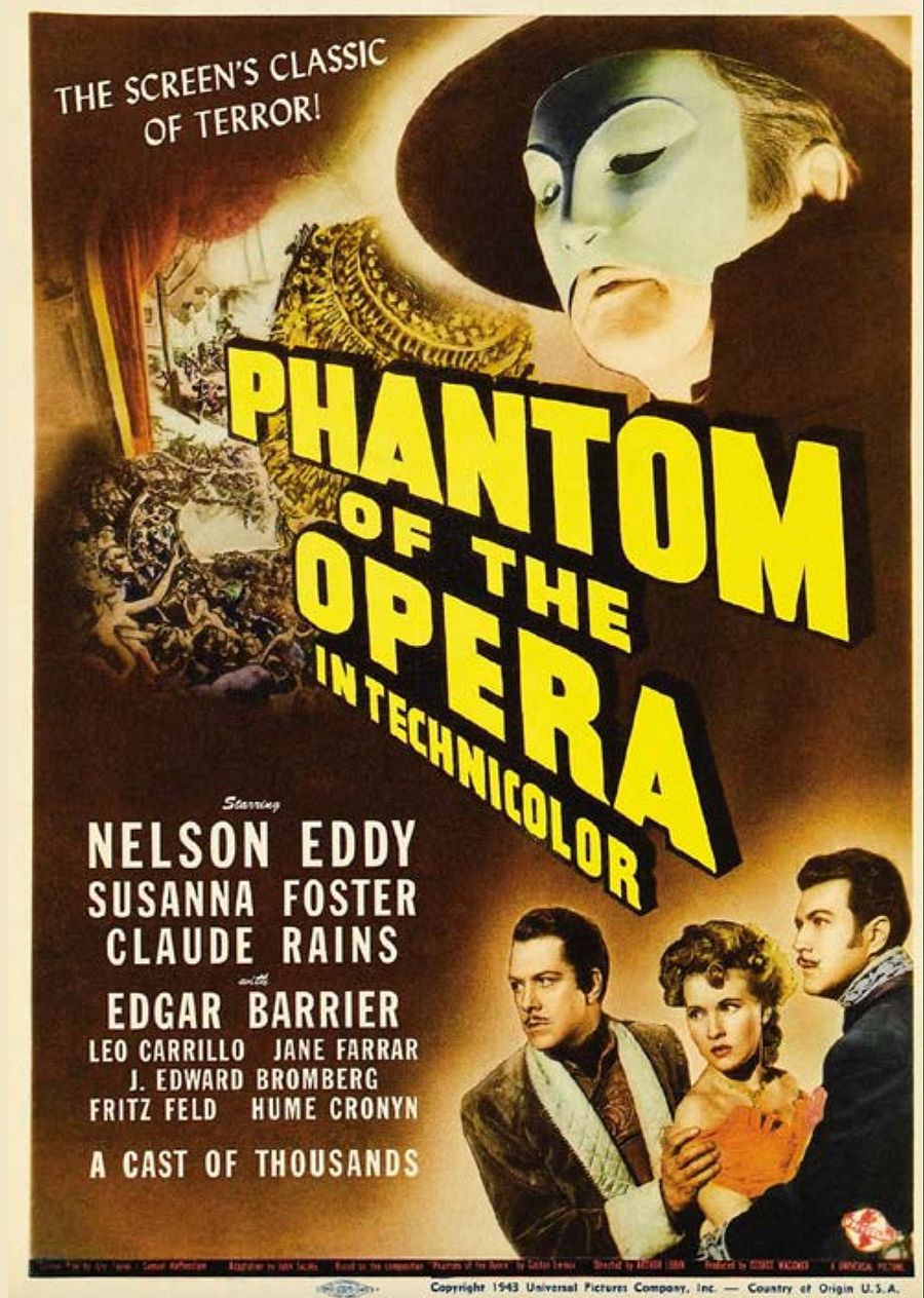 Un cartel promocional de cine presenta el rostro enmascarado de un personaje con un sombrero, con el título de la película en letras grandes. Se mencionan los nombres de los actores y se indica que la película está hecha "In Technicolor".