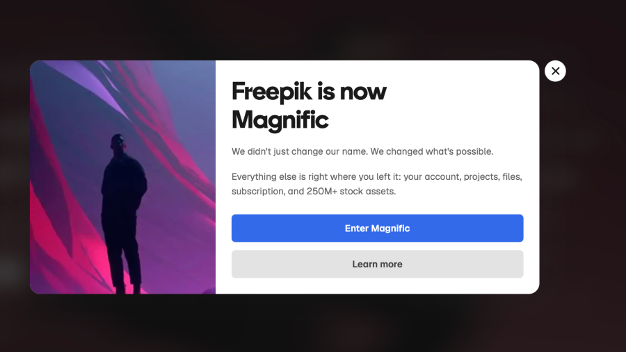 Captura de pantalla de la web de Magnific donde se puede leer en ingles Freepik is now Magnific". A la derecha se ve la silueta de un hombre con un fondo indeterminado